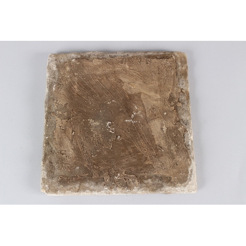 45 - A 19TH CENTURY QAJAR POTTERY TILE, with floral decoration.  27.5cms wide.