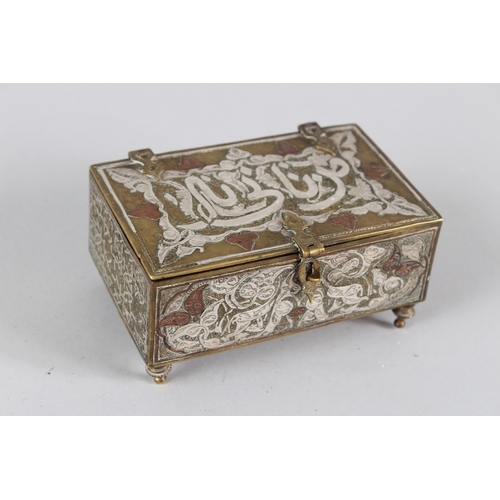 49 - A 19TH CENTURY SYRIAN SILVER AND COPPER INLAID BRASS BOX.  11cms wide.