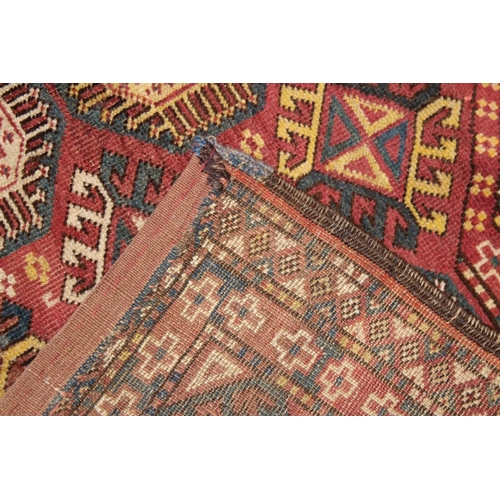 50 - AN ANTIQUE TURKMEN OR TURKISH WOOLLEN ASMALYK (HANGING).  130cms x 80cms.