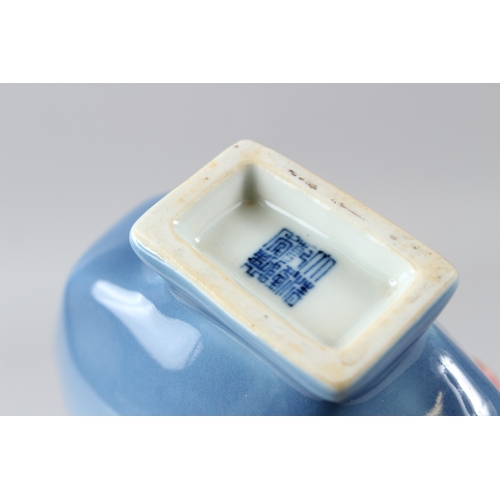 56 - A SMALL CHINESE POWDER BLUE GLAZED MOON FLASK, of octagonal form.  18cms high.