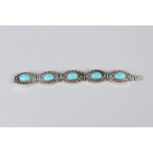 9 - A TIBETAN WHITE METAL BRACELET.  23cms long.
