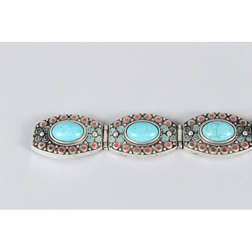 9 - A TIBETAN WHITE METAL BRACELET.  23cms long.