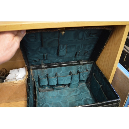 103 - A leather dressing case.