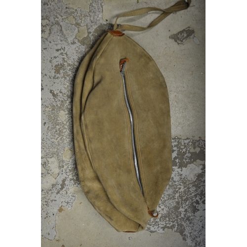 112 - A suede bag.