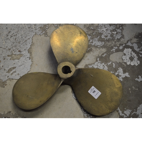 98 - An old bronze boat propeller.