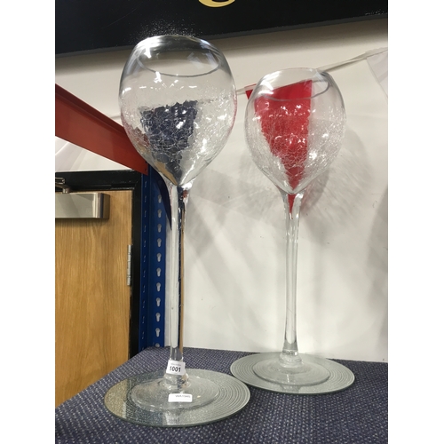 1001 - Two large display glasses.