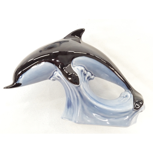 33 - Poole Pottery double dolphin and a single dolphin in usual black and light blue colourway plus one s... 