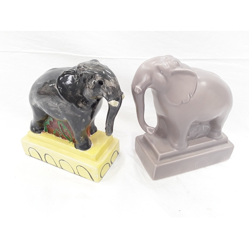 123 - Poole Pottery studio elephant figure together with one other Introduced in 1998.