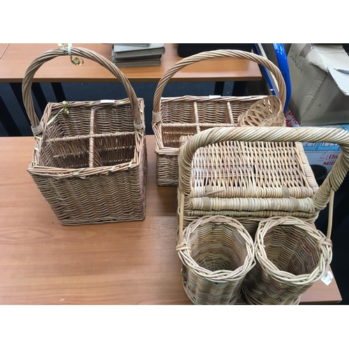 1014 - Three wicker wine baskets.