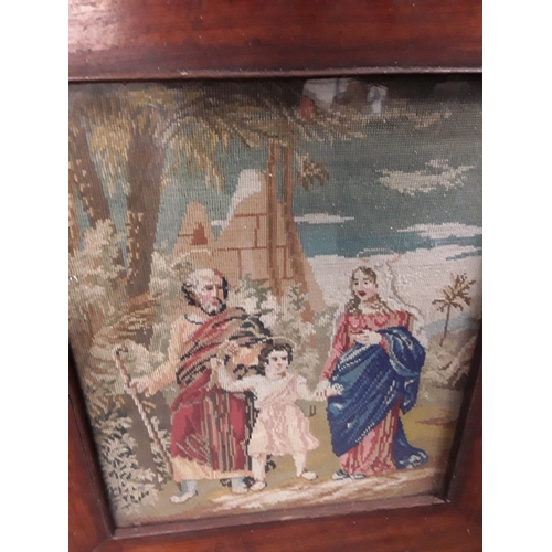 1143 - A framed and glazed religious embroidery, together with a large old countryside cottage picture.