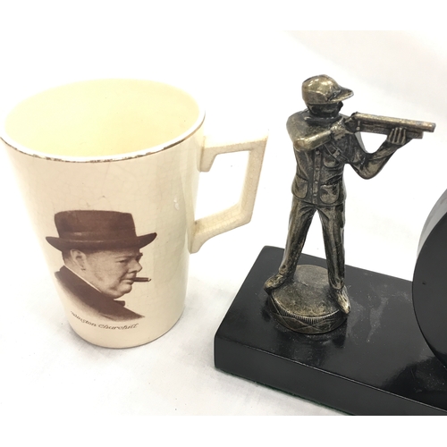 1230 - Smith's vintage time piece mounted as a shooting trophy and a Churchill mug.