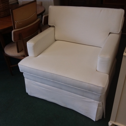 1418 - A modern white upholstered armchair .