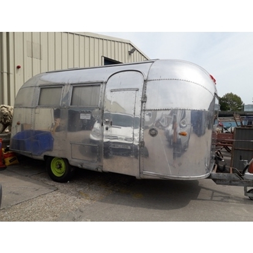 20 - A genuine American Airstream caravan, part conversion to a refreshment trailer.