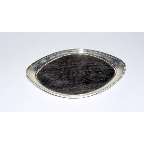 112 - An oval wood and silver surround teapot stand.