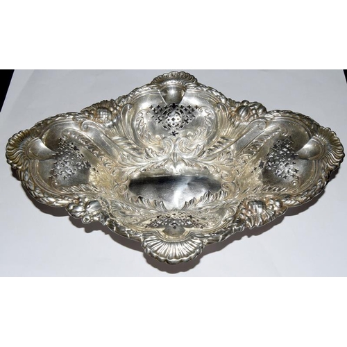 125 - A silver shaded pierced dish.