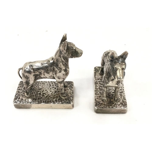 113 - Pair of silver hallmarked standing dogs.