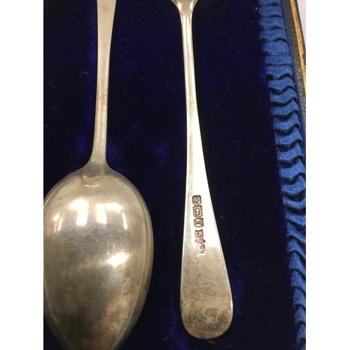 139 - Silver cased spoons and sugar tong.