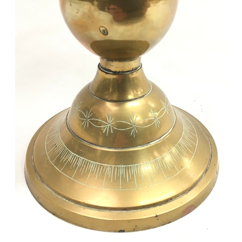 1603 - Brass globe with Asian scenes.