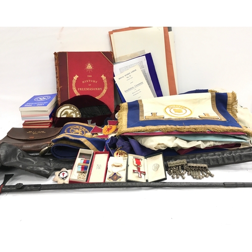 236 - Selection of Masonic regalia to include sword and jewels.