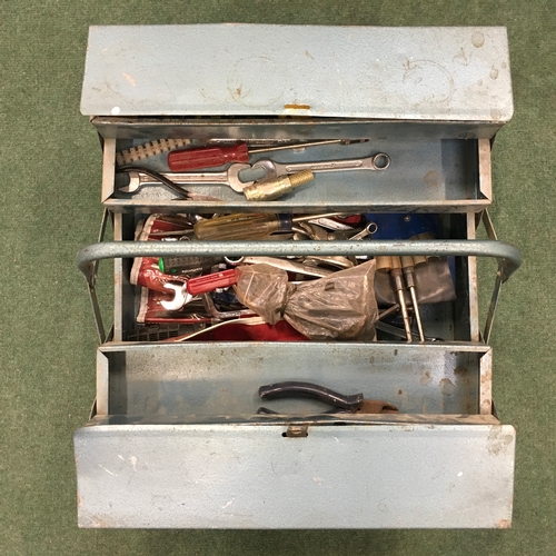 406 - A metal toolbox with assorted hand tools.