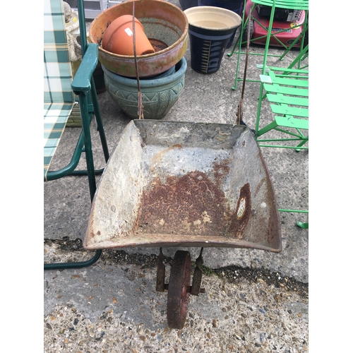 371A - A small ornamental wheelbarrow.