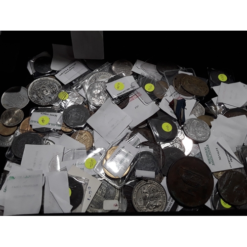 371 - An aluminium collectors case together with Memorial coins, money tokens, miscellaneous medals and re... 