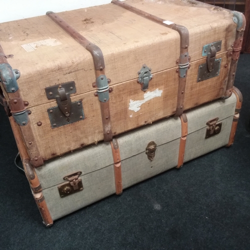 1539 - Two wood bound travel trunks.