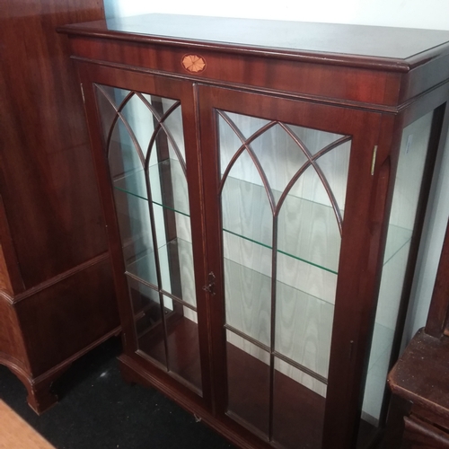 1531 - An Edwardian  mahogany China display cabinet resting on bracket feet.