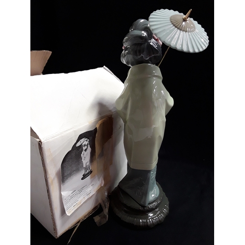 137 - Lladro: 'Japanese with parasol' figure with plain box No.4988.