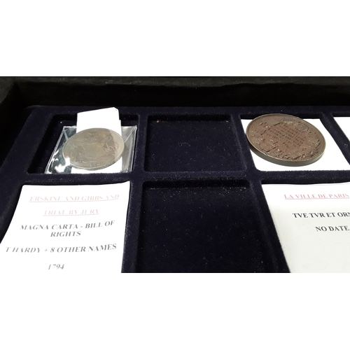 371 - An aluminium collectors case together with Memorial coins, money tokens, miscellaneous medals and re... 