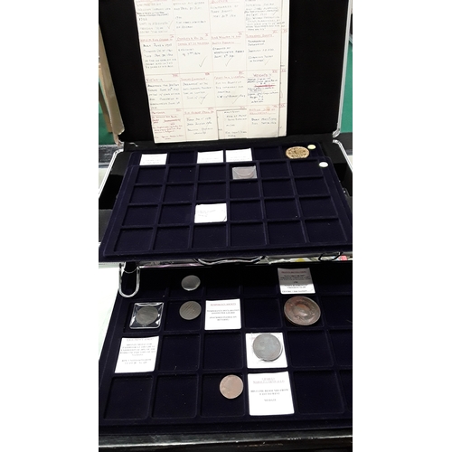 371 - An aluminium collectors case together with Memorial coins, money tokens, miscellaneous medals and re... 