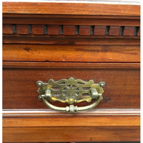 501 - An Edwardian mahogany library bookcase of four drawers over four doors, with brass handles and adjus... 