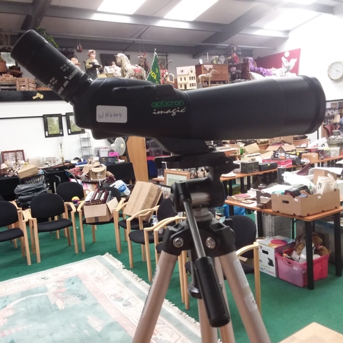 1249 - An opticron imagic telescope on stand.