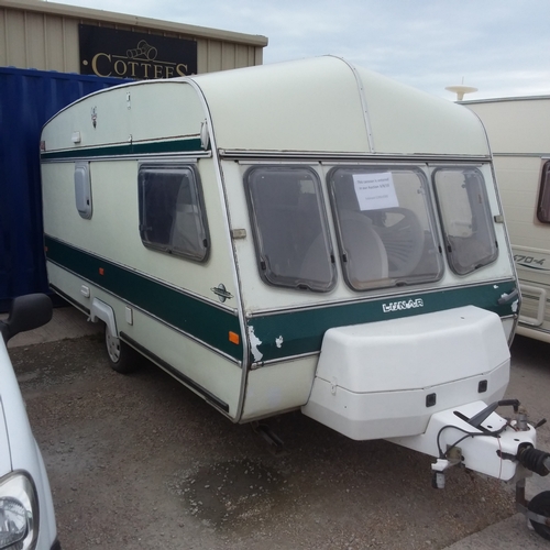 1414 - A Sunbeam Luna 4 birth caravan with contents and accessories. To include: awning, chemical toilet, g... 