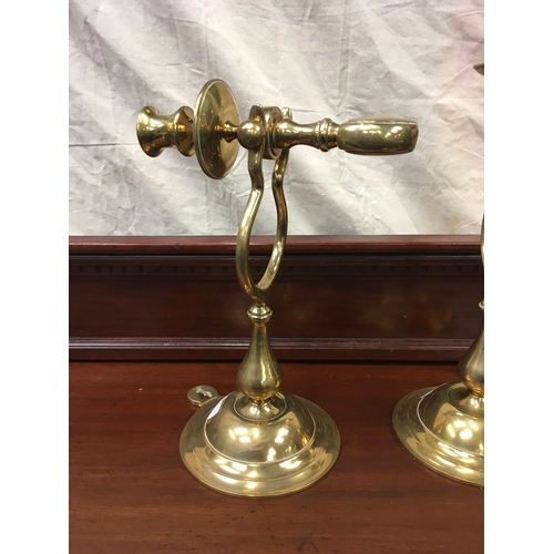 478 - Good pair of brass ships gimble candle holders.