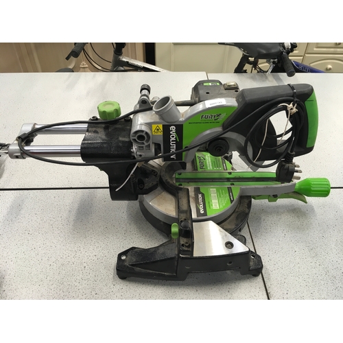 2111 - An Evolution sliding mitre saw (ref:121).