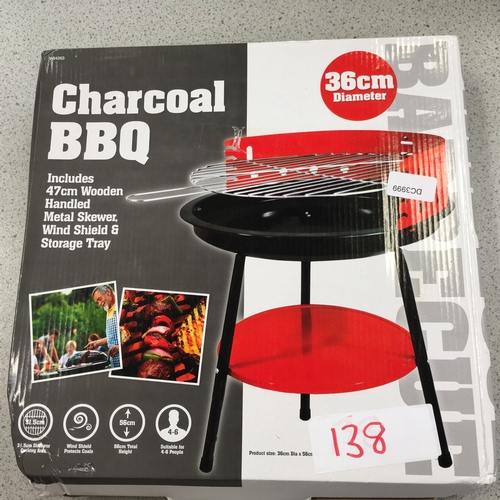 2145 - A boxed charcoal bbq set (ref:138).