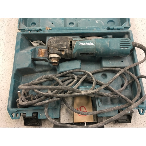 2115 - A Makita TM3010C power cutter (ref:65).