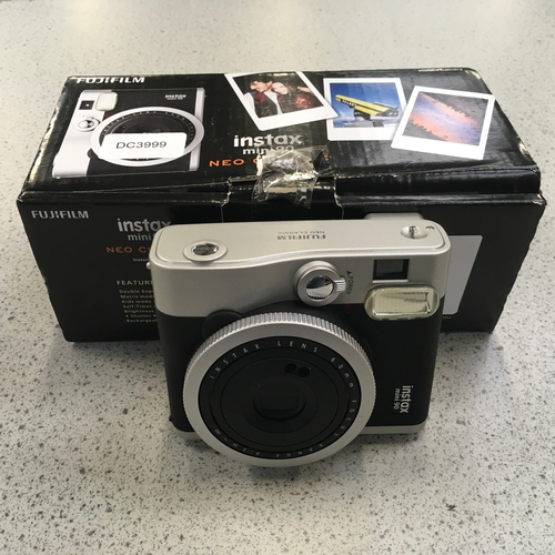 2208 - A FujiFilm instax mini 90 camera (ref:179).