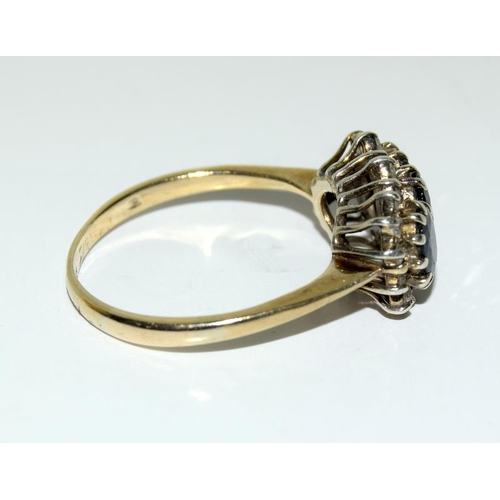 2295 - Ladies gold diamond and sapphire ring. Size O.