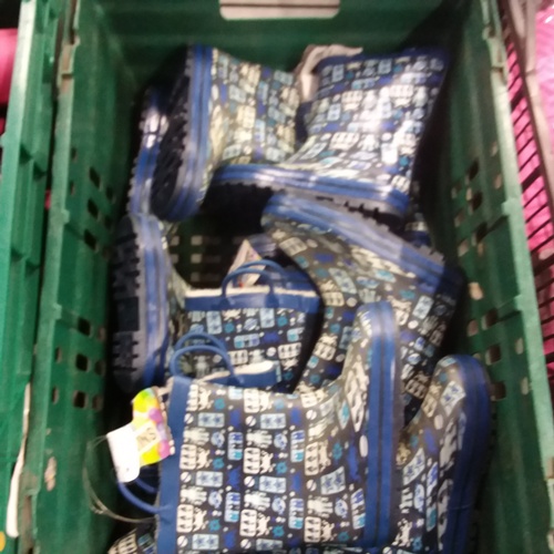 2063 - A crate of kids blue wellies.