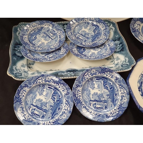 1039 - A collection of blue and white meat and other plates.