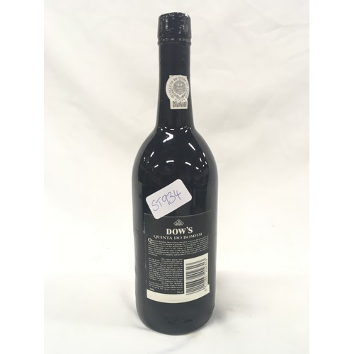 119 - A 1986 bottle of Dow’s Quinta do Bomfim vintage port.