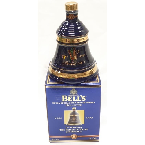 141 - A boxed Wade porcelain decanter with Bell’s Extra Special Old Scotch Whisky to commemorate The Princ... 