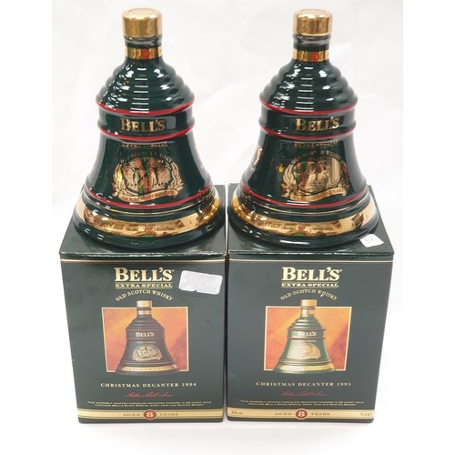 145 - Two boxed Bell’s Extra Special Old Scotch Whisky Wade porcelain Christmas decanters: 1994 “The Blend... 