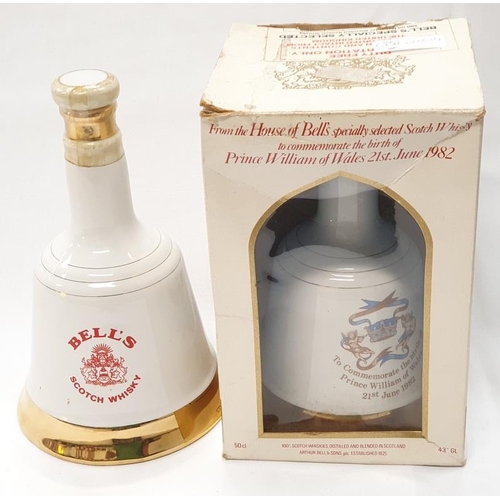 150 - Two Bell’s Scotch Whisky Wade porcelain decanters (one boxed) to commemorate the births of Princes H... 