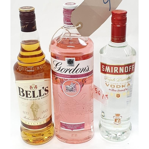 151 - Three bottles of alcohol: 1L Gordons Pink gin, 70cl Smirnoff Vodka and 70cl Bells Scotch whiskey (Re... 