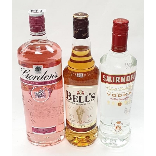 154 - Three bottles of alcohol: 1L Gordons Pink gin, 70cl Bells Scotch Whiskey and 70cl Smirnoff Vodka (Re... 