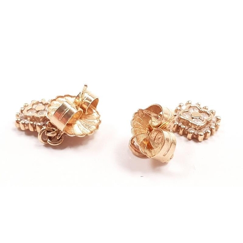 329 - 14ct Gold and Diamond drop earrings.