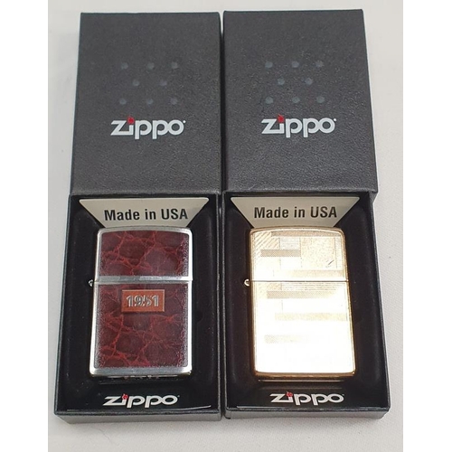 373 - Two boxed Zippo lighters (REF 66).